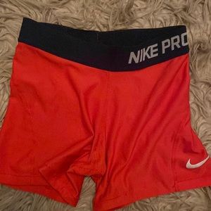 Red Nike pro shorts
